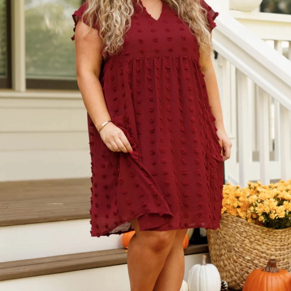 Never worn, red mid length dress with pockets